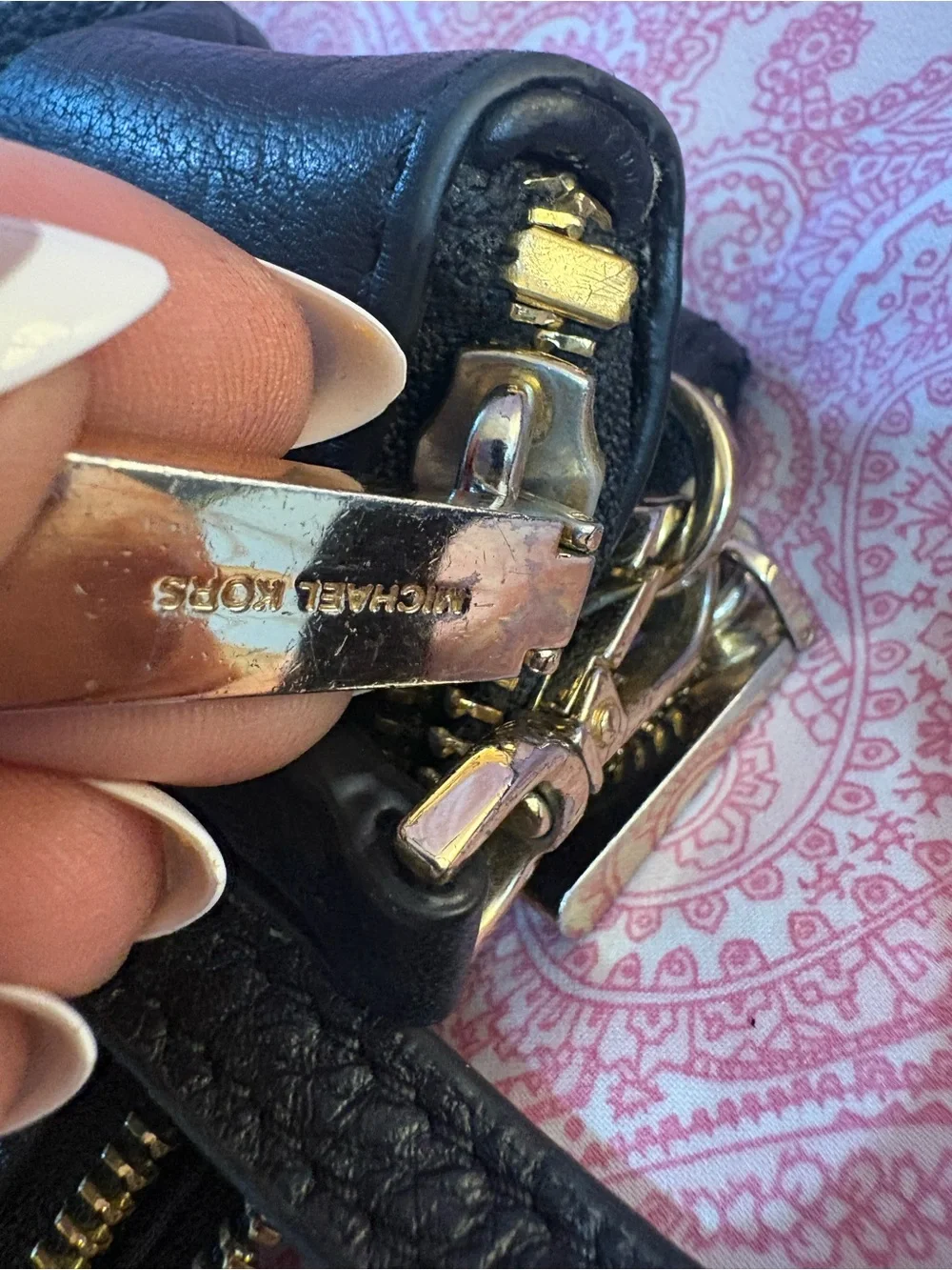 Michael Kors Black Pebbled Triple-Zip Wristlet with Gold Hardware